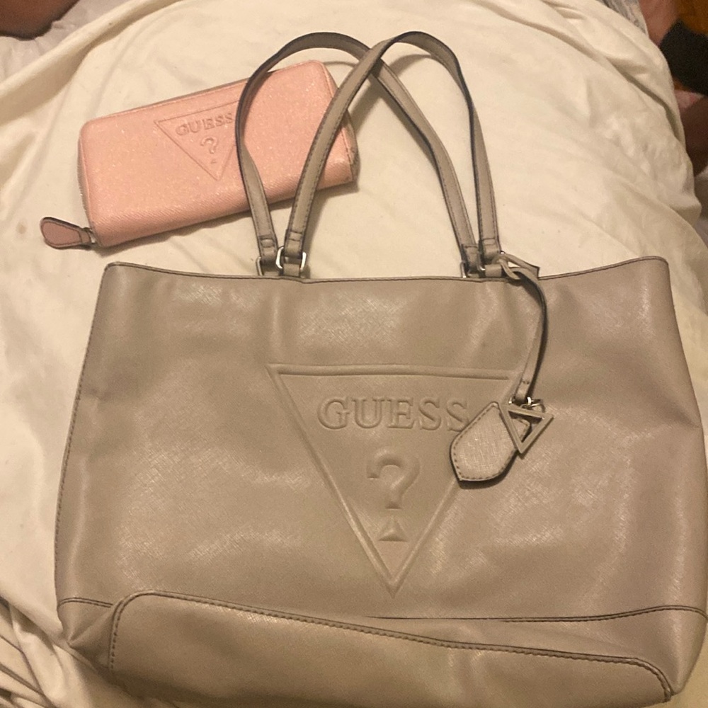 Grey Guess purse with matching pink wallet.